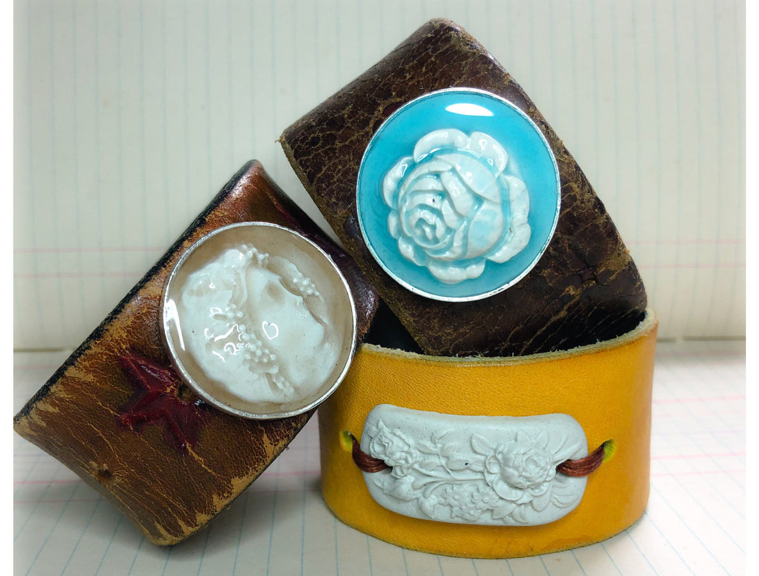 Three leather cuffs